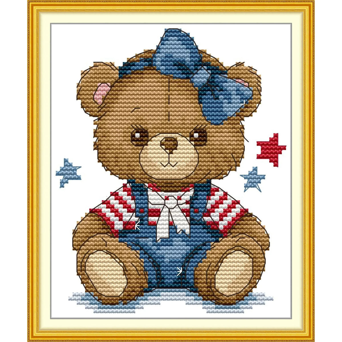 Diagramme de point de croix avec un ours en peluche mignon portant une salopette en jean un t-shirt rayé rouge et blanc et un grand nœud bleu sur la tête.