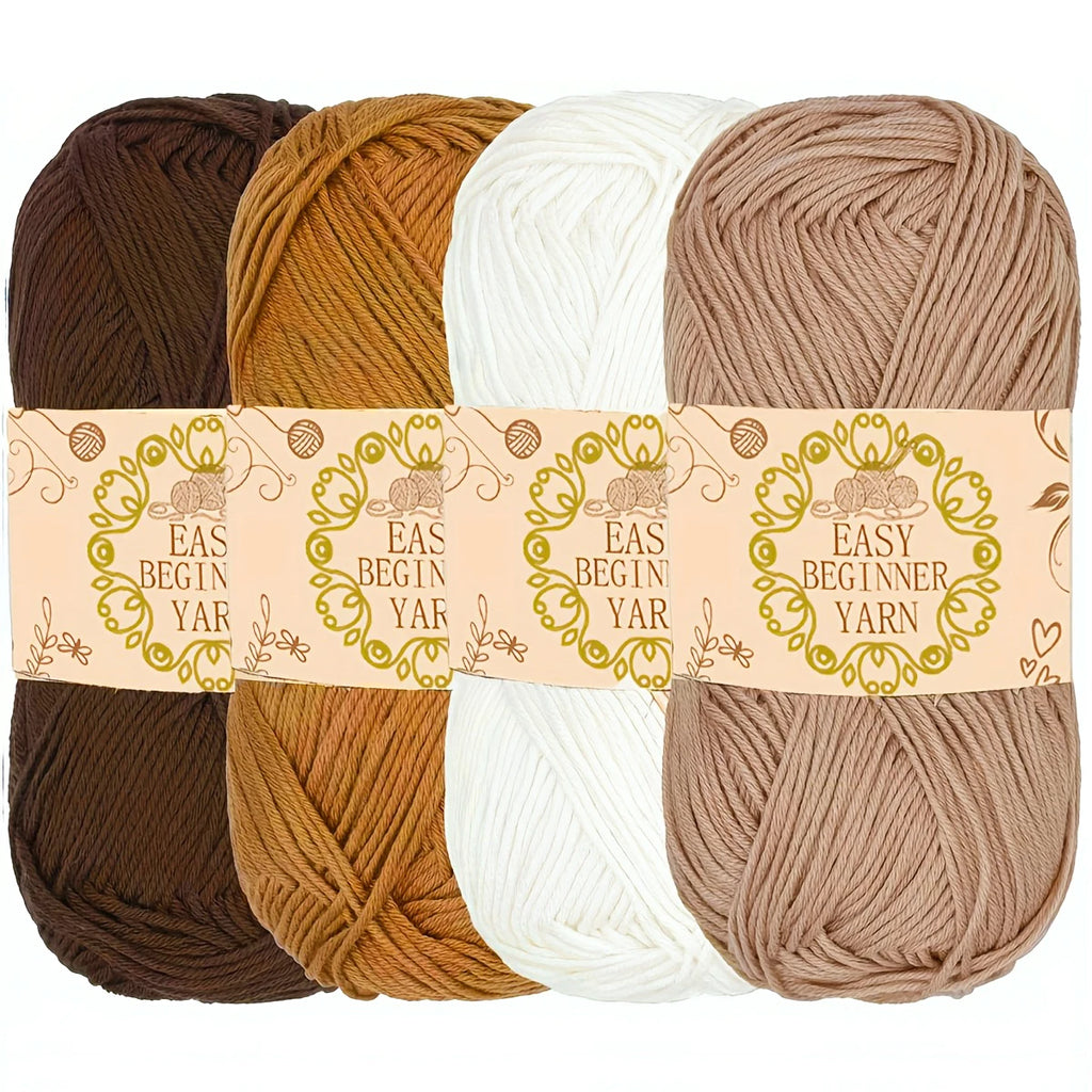 Quatre pelotes de laine pour débutant Easy Beginner Yarn de couleurs marron ocre blanc et beige
