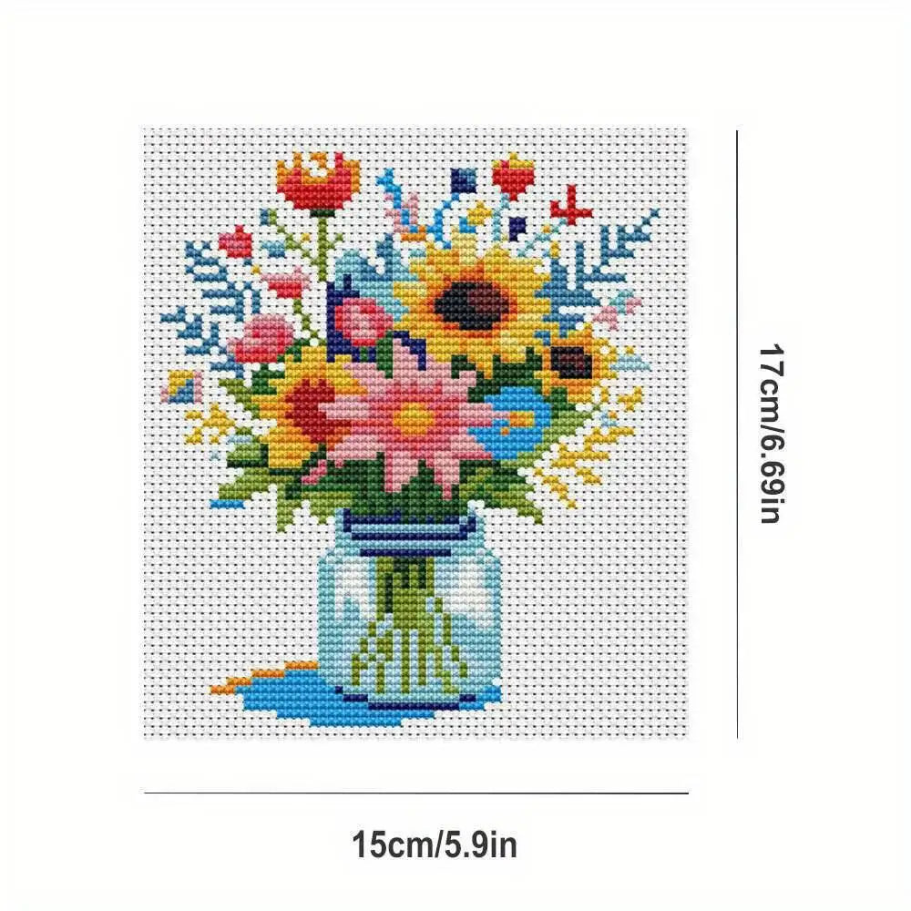 Schema technique affichant les dimensions de 15 par 15 cm pour un motif individuel de broderie bocal de fleurs et tournesols.