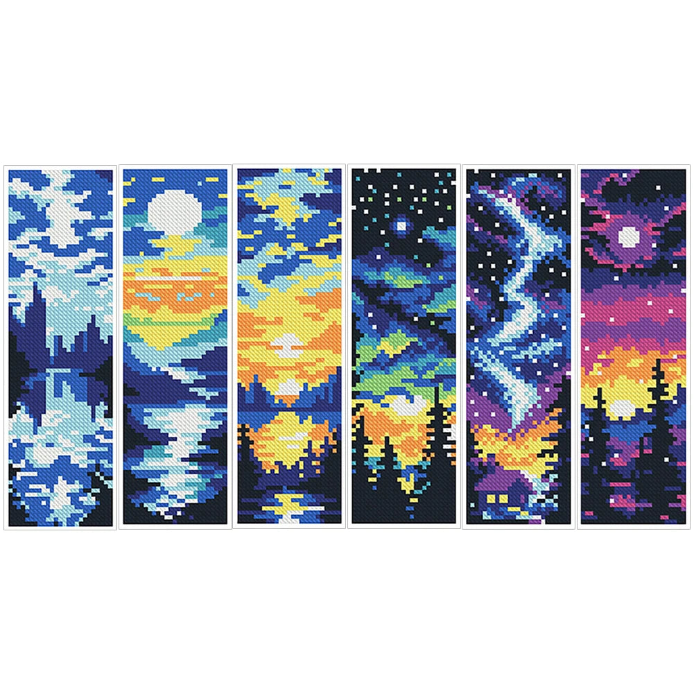 Lot de six kits de marque-pages en point de croix avec des motifs de paysages de nature féerique et ciels étoilés de nuit.